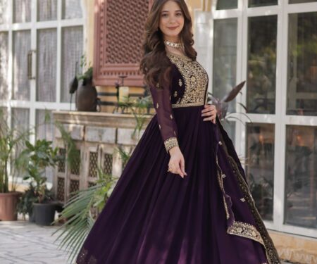 Women's Luxurious Plum Velvet Anarkali Gown with Heavy Gold Zari & Sequin Embroidery – Perfect for Weddings & Grand Festivities